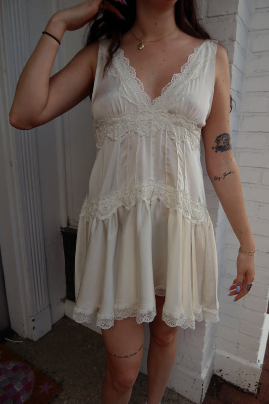 In this Groove Mini Slip Dress